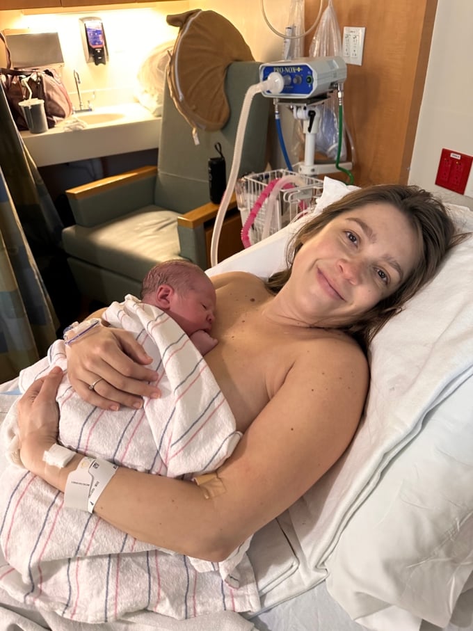 mother with baby on chest in hospital after giving birth